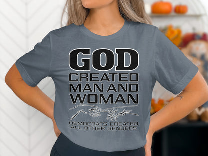 Gray t-shirt with text: "GOD CREATED MAN AND WOMAN. DEMOCRATS CREATED ALL OTHER GENDERS."