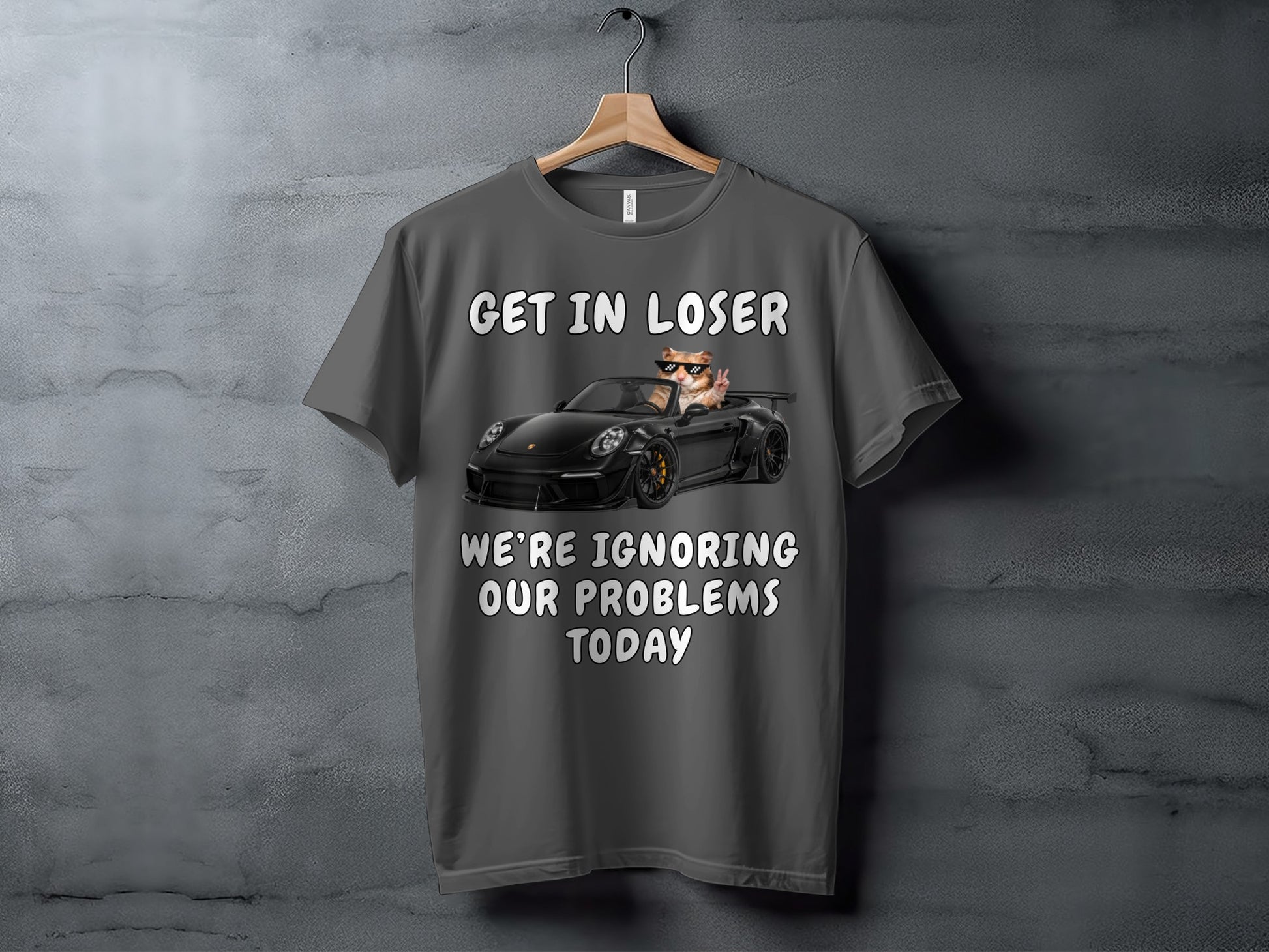 Gray t-shirt with text "GET IN LOSER" and a cat in a convertible ignoring problems.