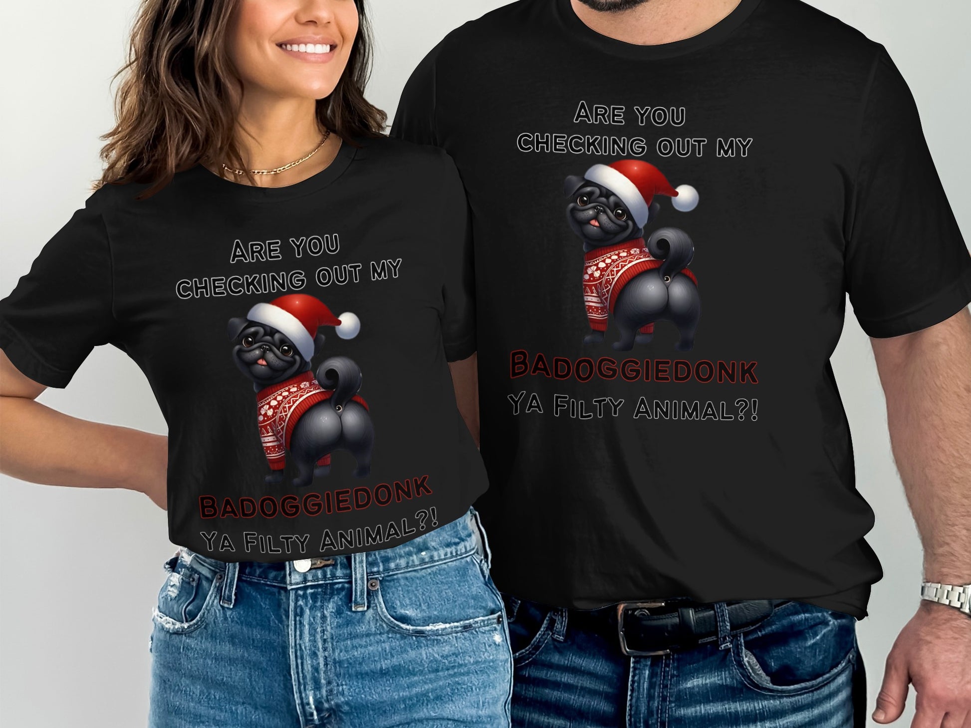 Black t-shirts featuring a pug in a Santa hat and sweater with text.