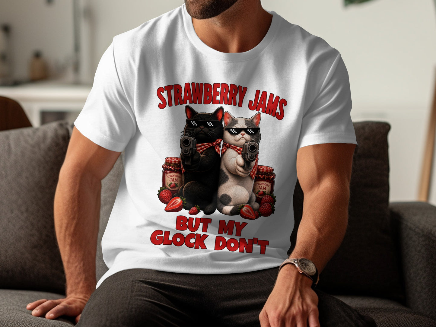 White t-shirt with cats holding guns and text "Strawberry Jams But My Glock Don't".