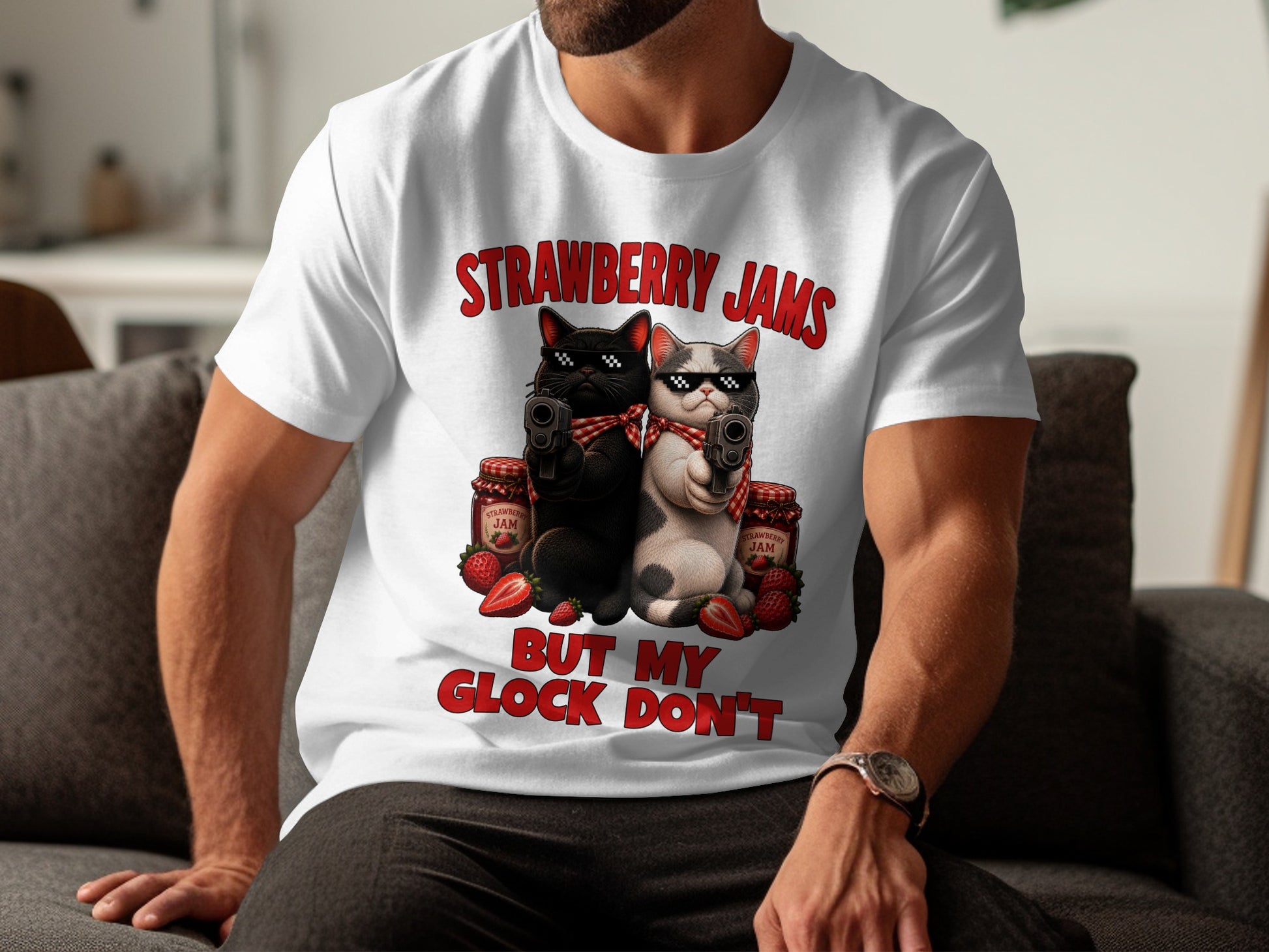 White t-shirt with cats holding guns and text "Strawberry Jams But My Glock Don't".