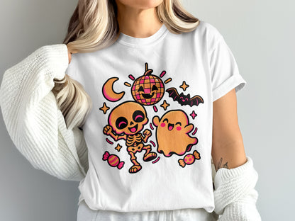 White t-shirt with Halloween design featuring a skeleton, ghost, disco ball, and candy.