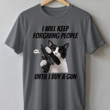 Gray t-shirt with text "I WILL KEEP FORGIVING PEOPLE UNTIL I BUY A GUN" and a cat holding a gun.