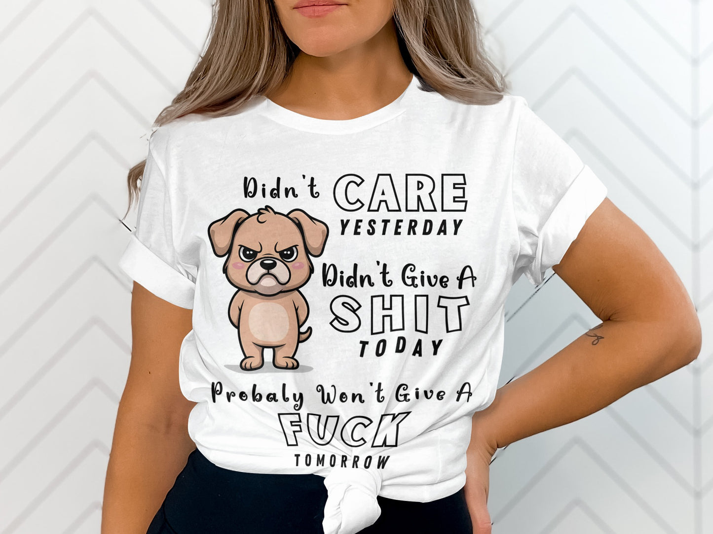 White t-shirt with cartoon dog graphic and text about not caring.