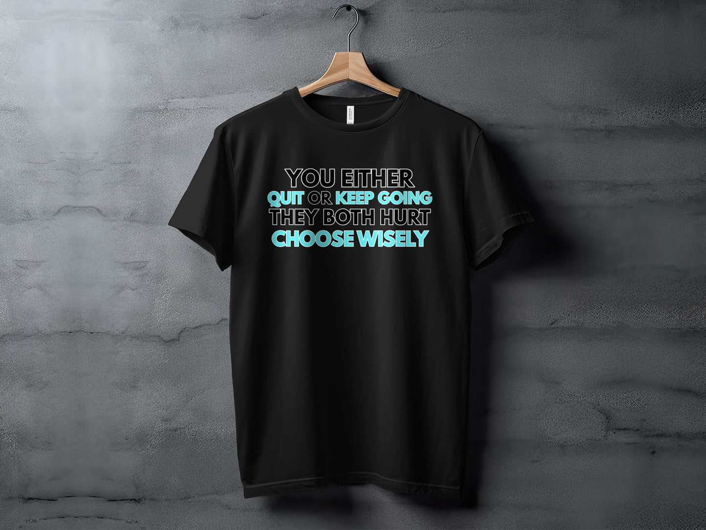 Black t-shirt with text: "You either quit or keep going, they both hurt. Choose wisely."