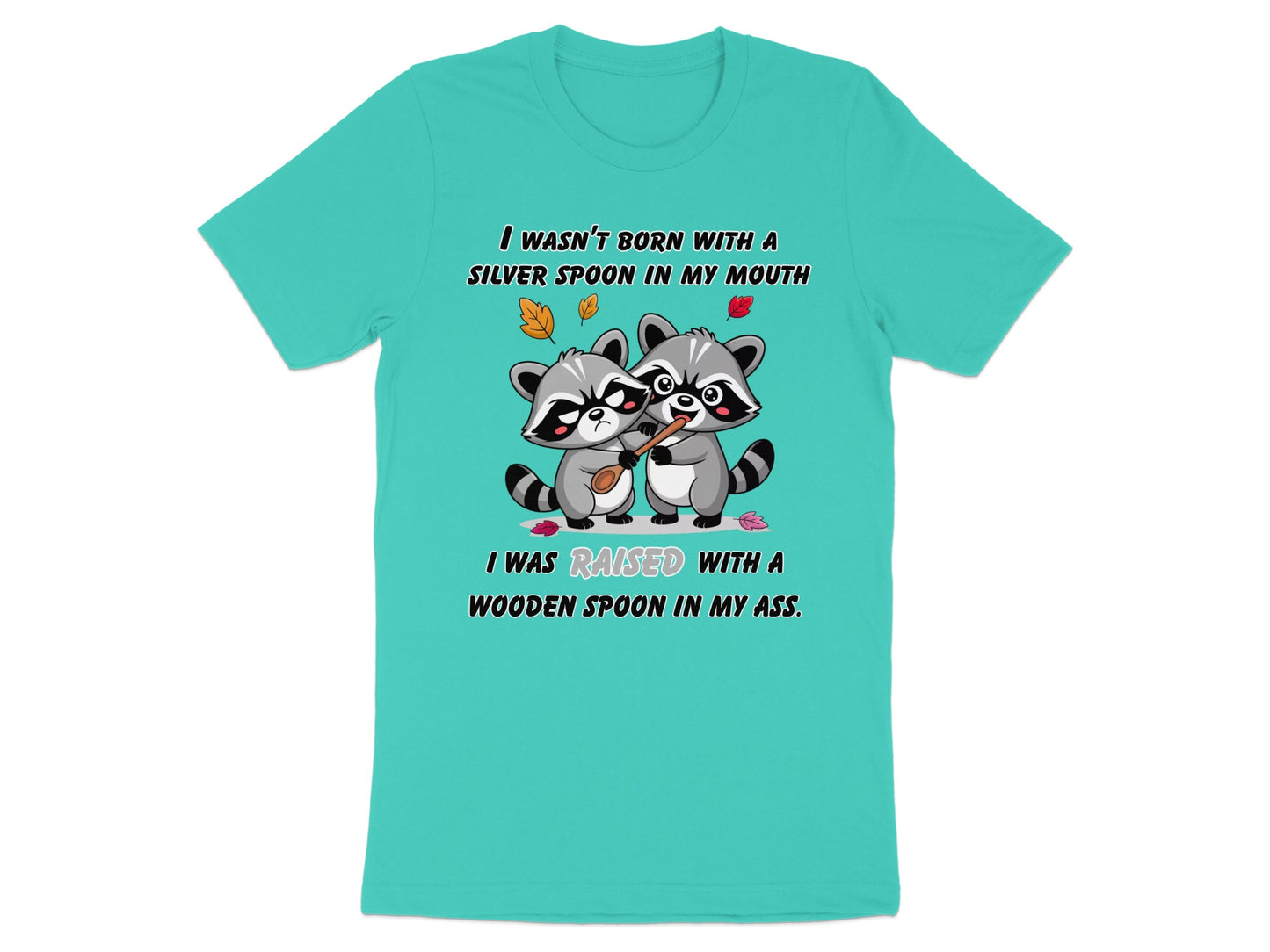 T-shirt with two raccoons and text "I WASN'T BORN WITH A SILVER SPOON IN MY MOUTH".
