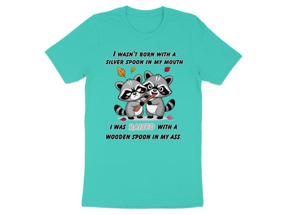 T-shirt with two raccoons and text "I WASN'T BORN WITH A SILVER SPOON IN MY MOUTH".