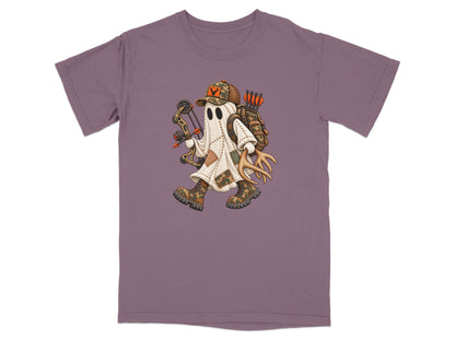 A mauve t-shirt with a graphic of a ghost holding a bow and arrow, wearing camo boots and a matching cap.