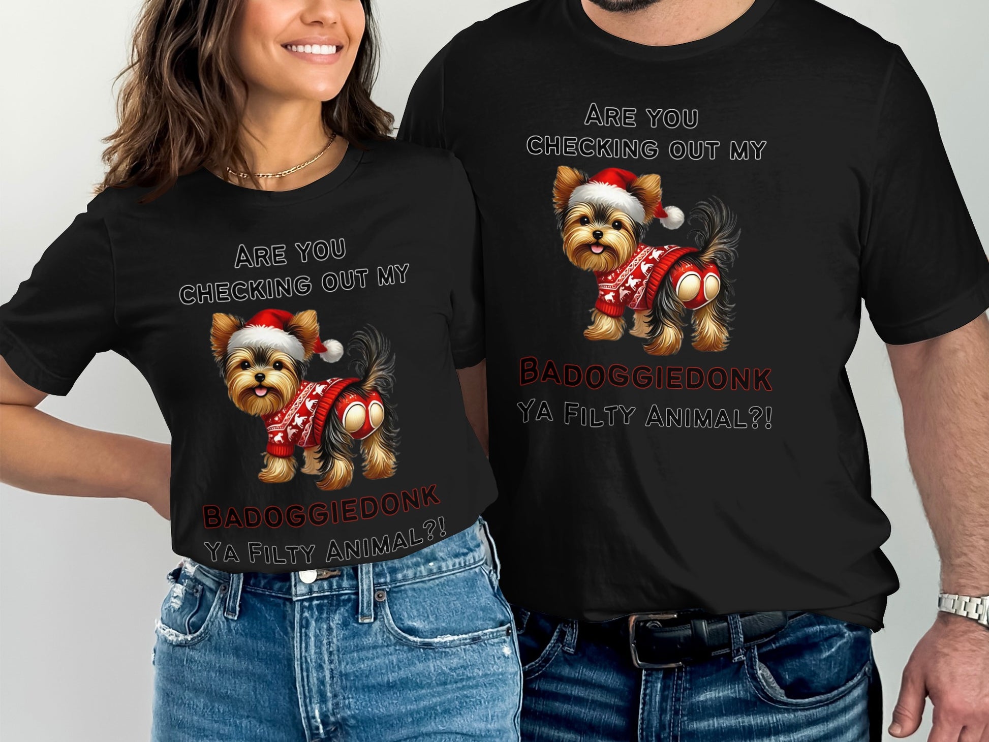 Black t-shirts feature a Yorkshire Terrier in a Santa hat and sweater with text.