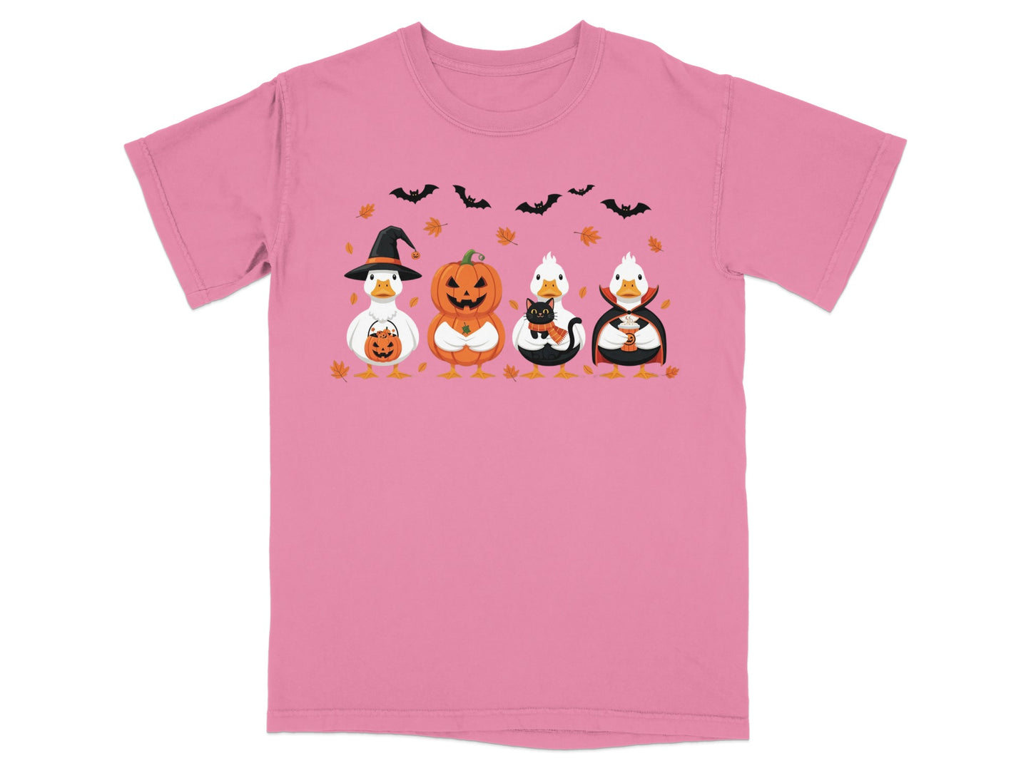 Pink t-shirt with four Halloween-themed ducks and falling leaves.