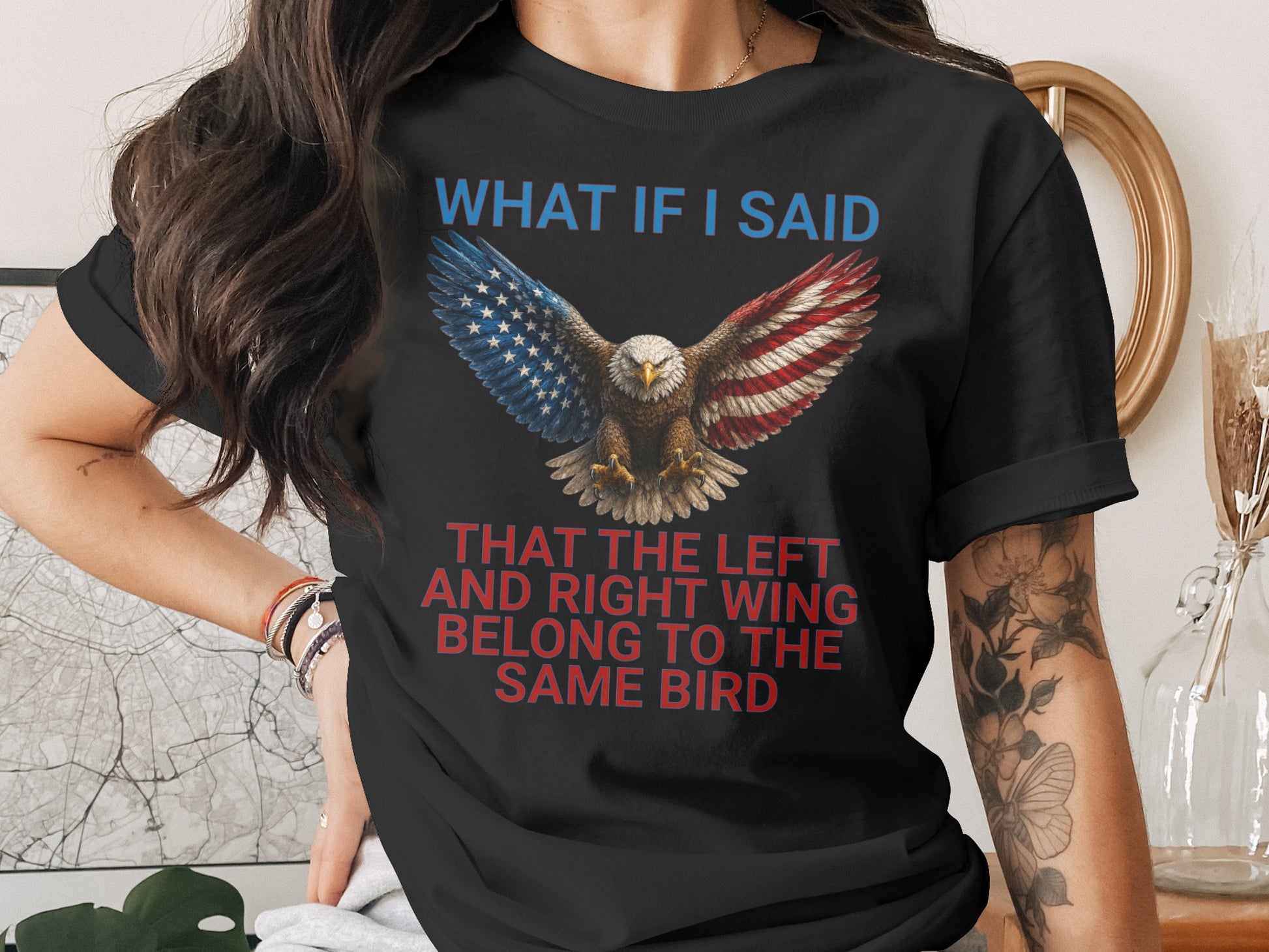Black t-shirt with eagle and patriotic wings; text says "What if I said that the left and right wing belong to the same bird."