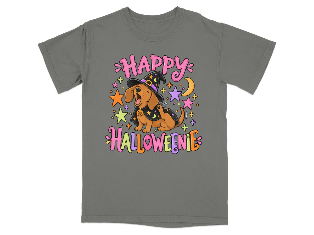 Dachshund in witch hat and cape with text "Happy Halloweenie" and stars.