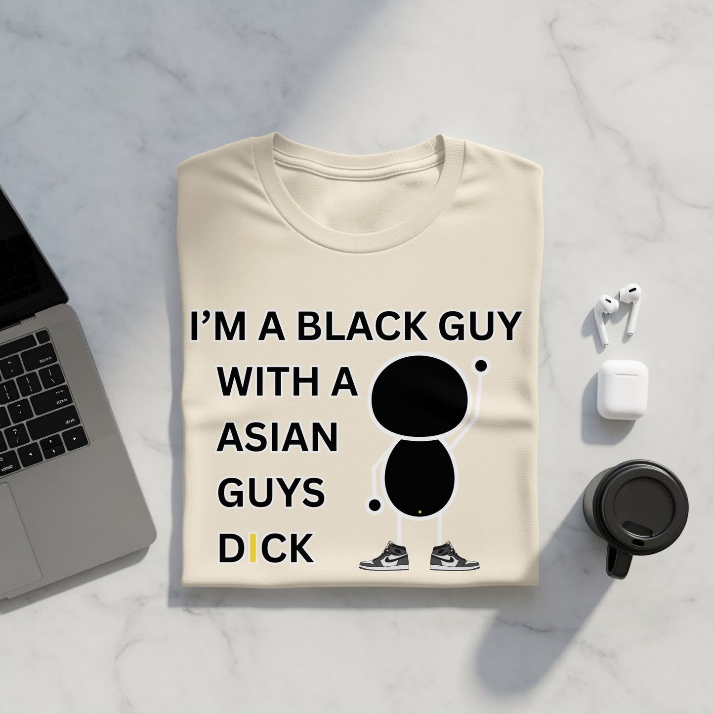 Cream t-shirt with black text and graphic of a figure wearing sneakers.