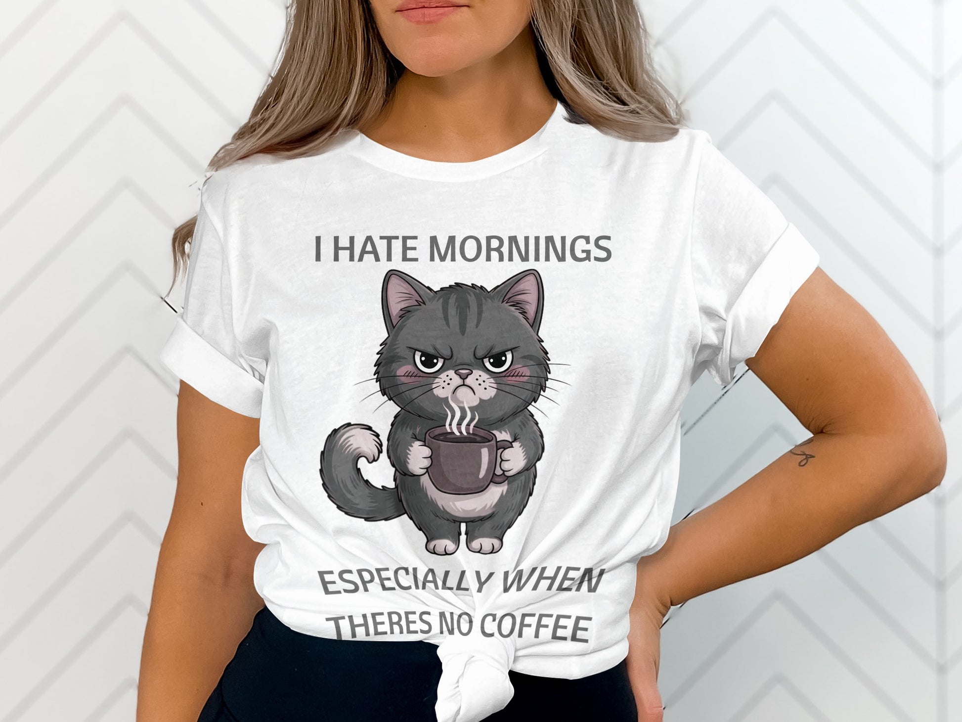 White t-shirt with a grumpy cat holding coffee and text "I HATE MORNINGS".