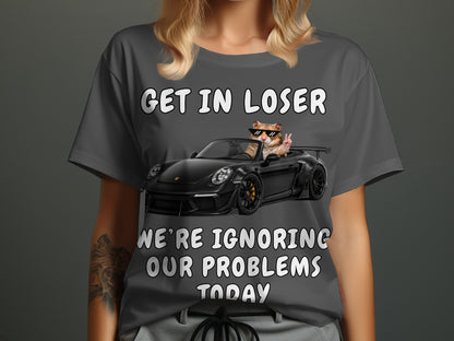 T-shirt graphic with text and a cat driving a car.