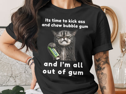 Black t-shirt with text and a cat holding Doublemint gum.