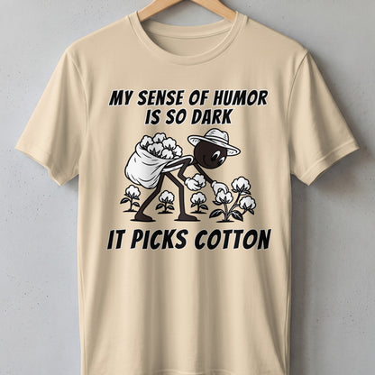 T-shirt with black text and cartoon graphic of person picking cotton.