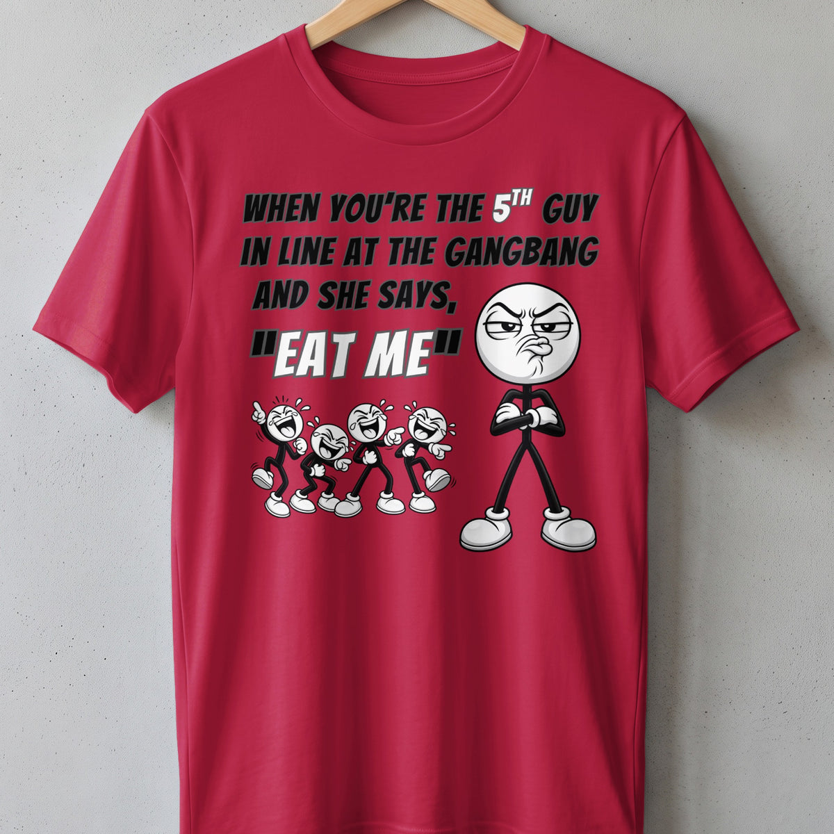 Red t-shirt with cartoon text "When you're the 5th guy in line at the gangbang and she says, 'Eat me'".