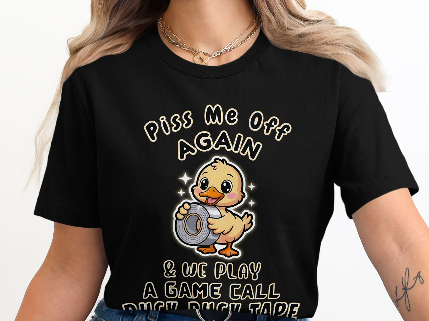 Black t-shirt with text "Piss Me Off Again & We Play A Game Call Duck Duck Tape" and a duck holding duct tape.