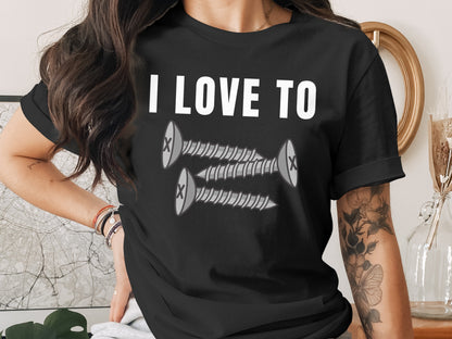Black t-shirt with "I LOVE TO" and three screws graphic design.