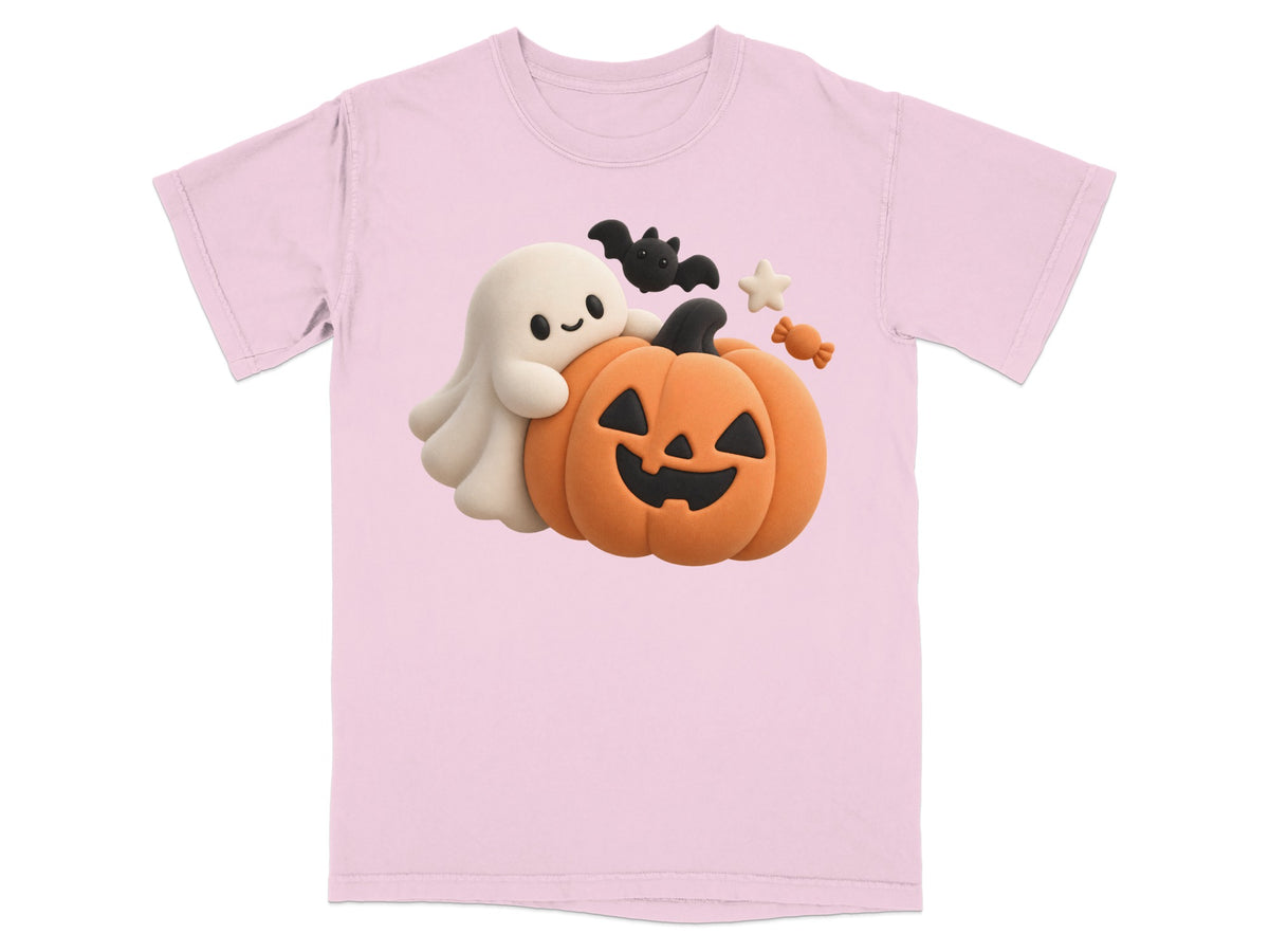 Pink t-shirt with a ghost hugging a jack-o'-lantern, bat, and candy design.