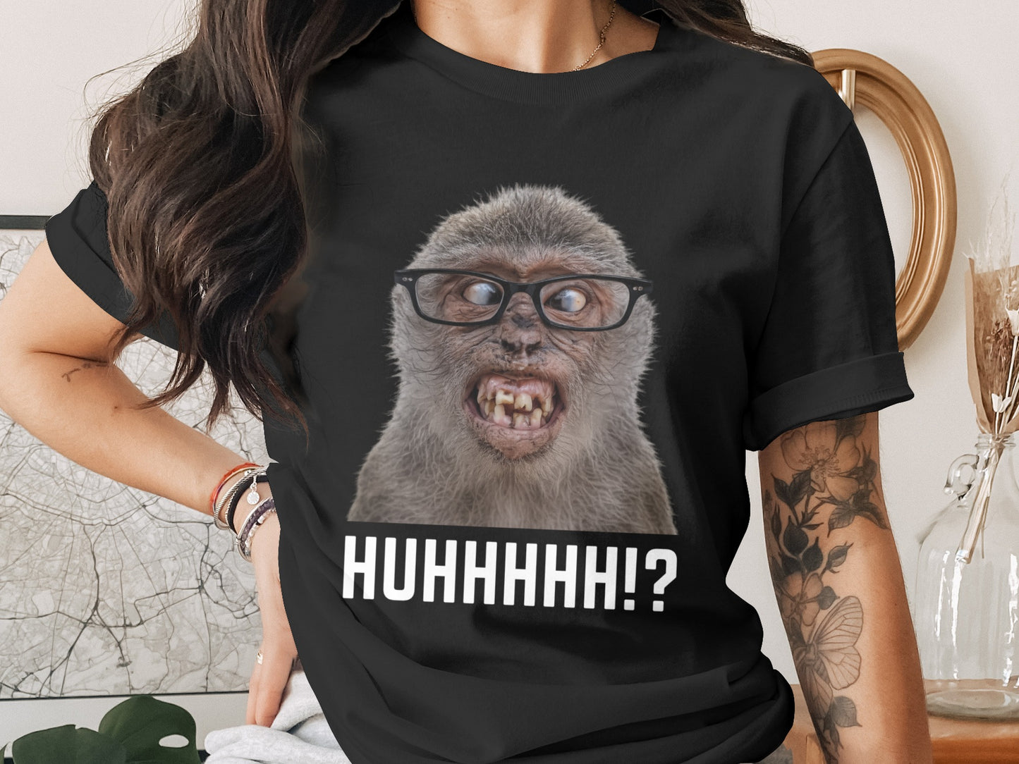Black t-shirt with a surprised monkey wearing glasses and text "HUHHHHH!?"