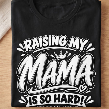 Black t-shirt with white text: "RAISING MY MAMA IS SO HARD!"