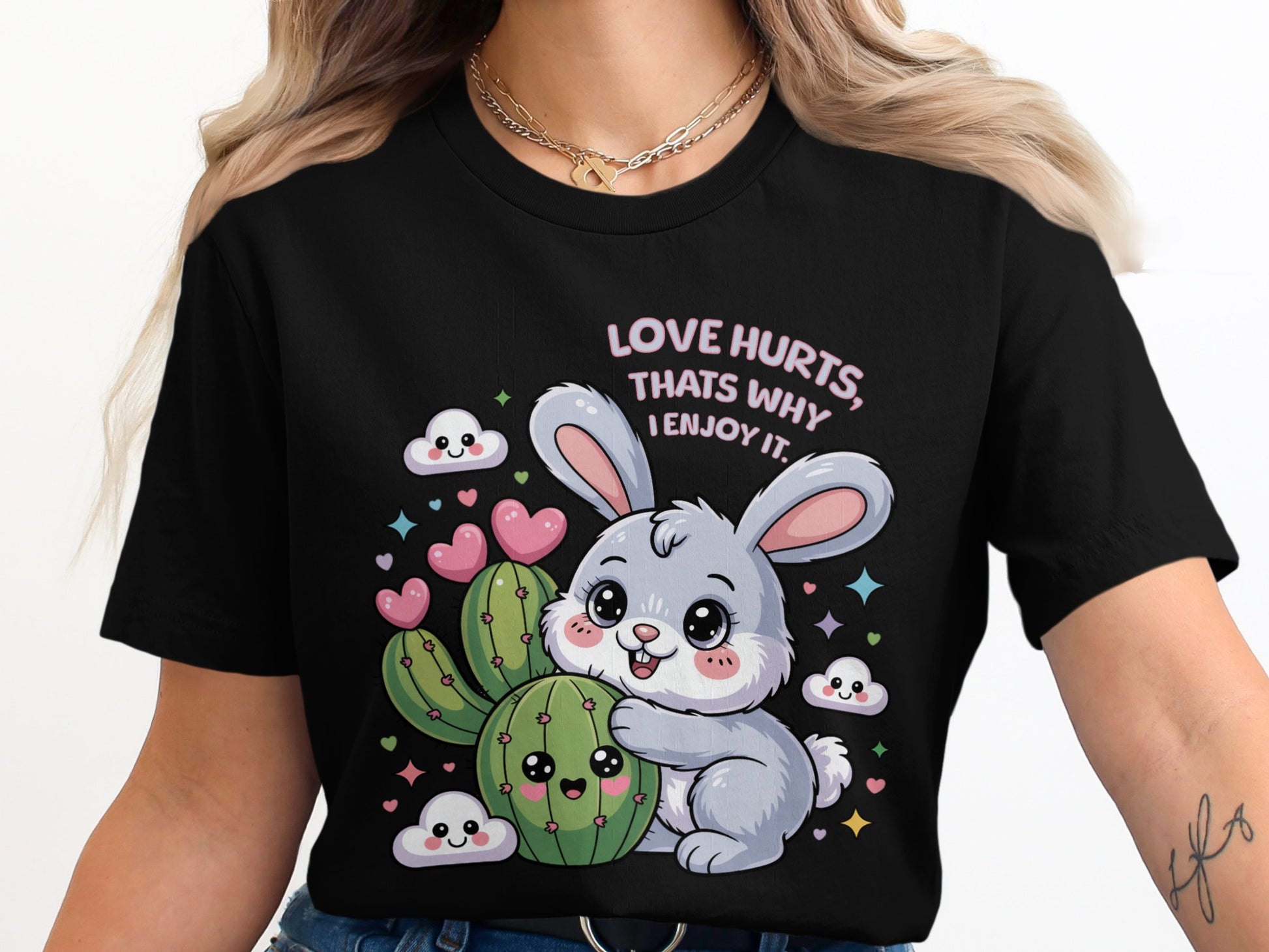 A gray bunny hugs a smiling cactus, with hearts and clouds.