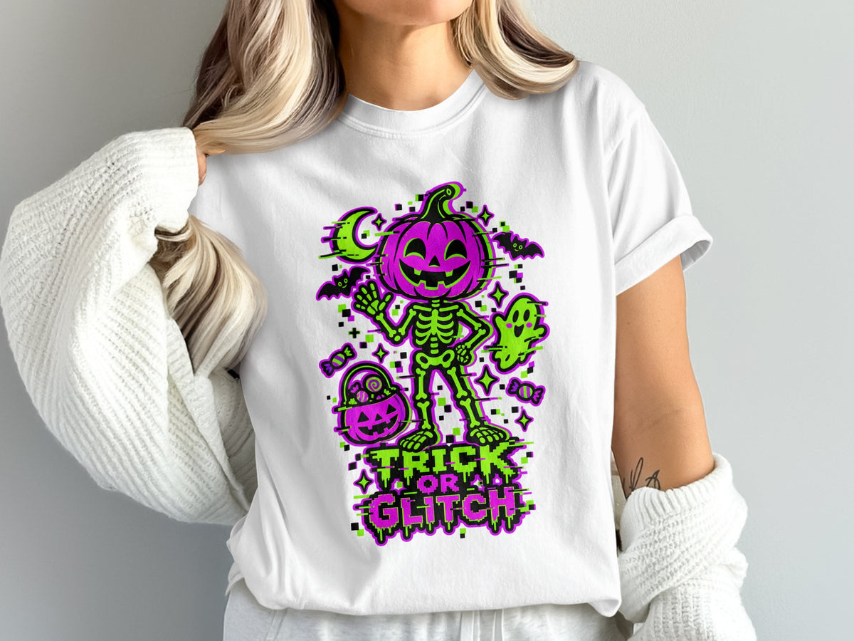 White t-shirt with purple and green "Trick or Glitch" Halloween graphic.