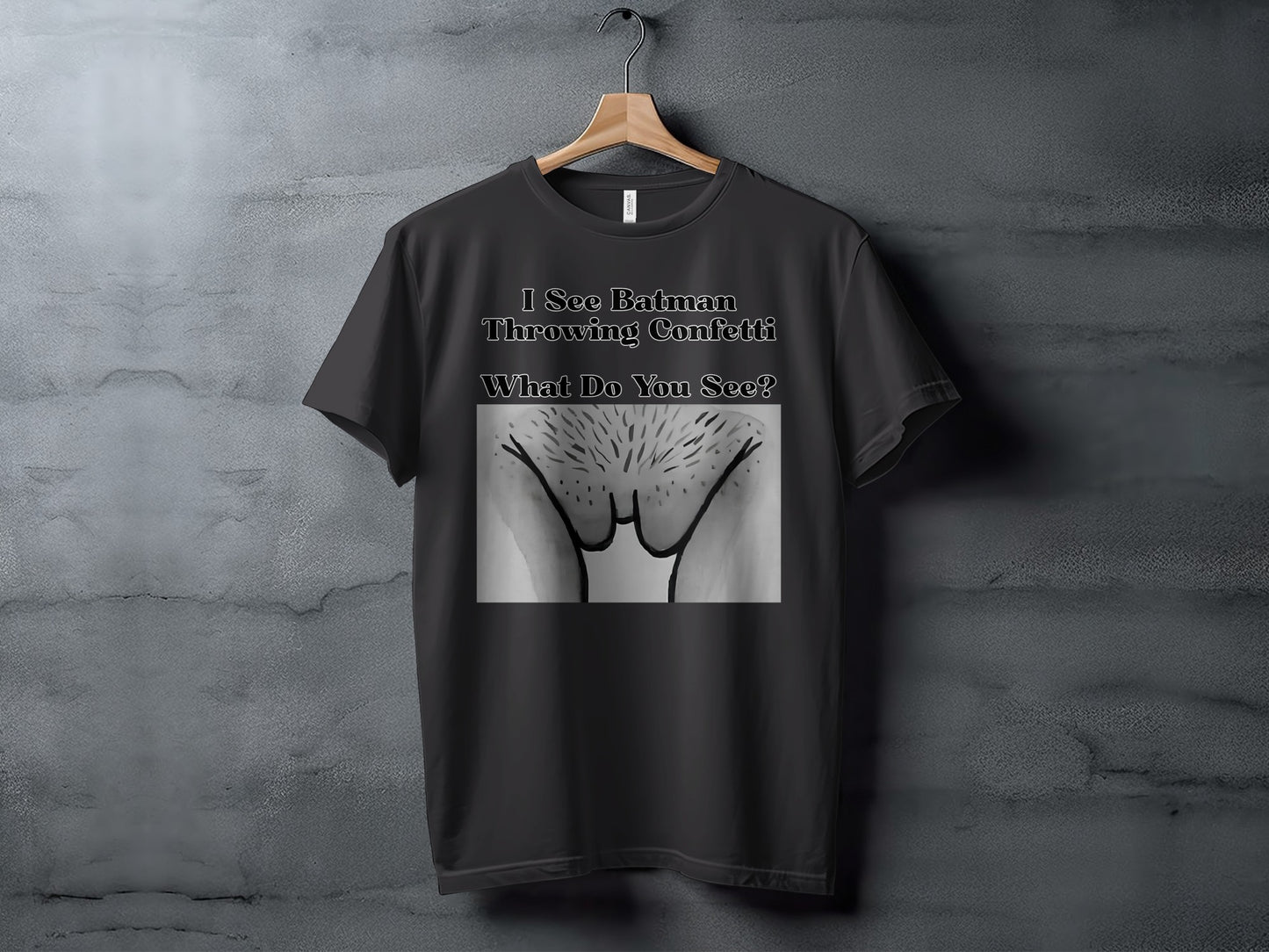 Dark gray t-shirt with text "I See Batman Throwing Confetti What Do You See?" and a graphic.