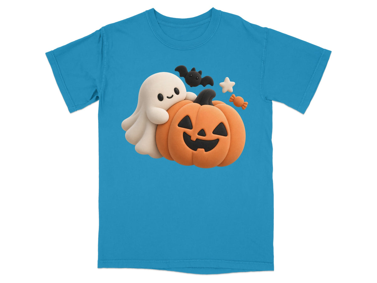 Blue t-shirt with a ghost hugging a jack-o'-lantern and Halloween decorations.