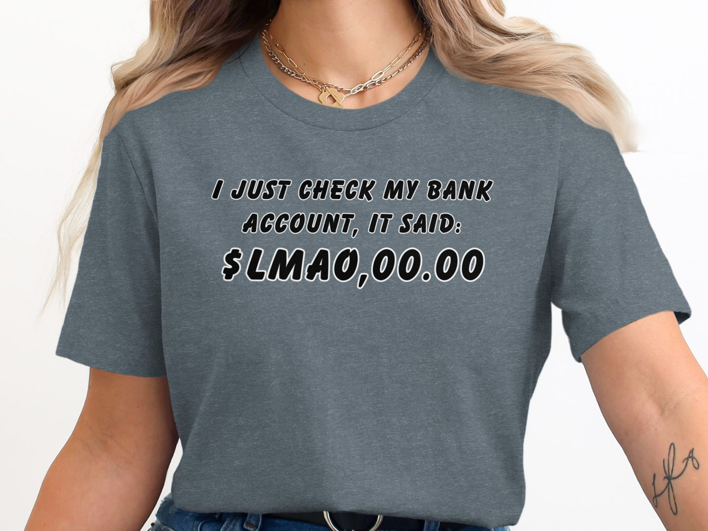 Grey t-shirt with text "I JUST CHECK MY BANK ACCOUNT, IT SAID: $LMAO,00.00".