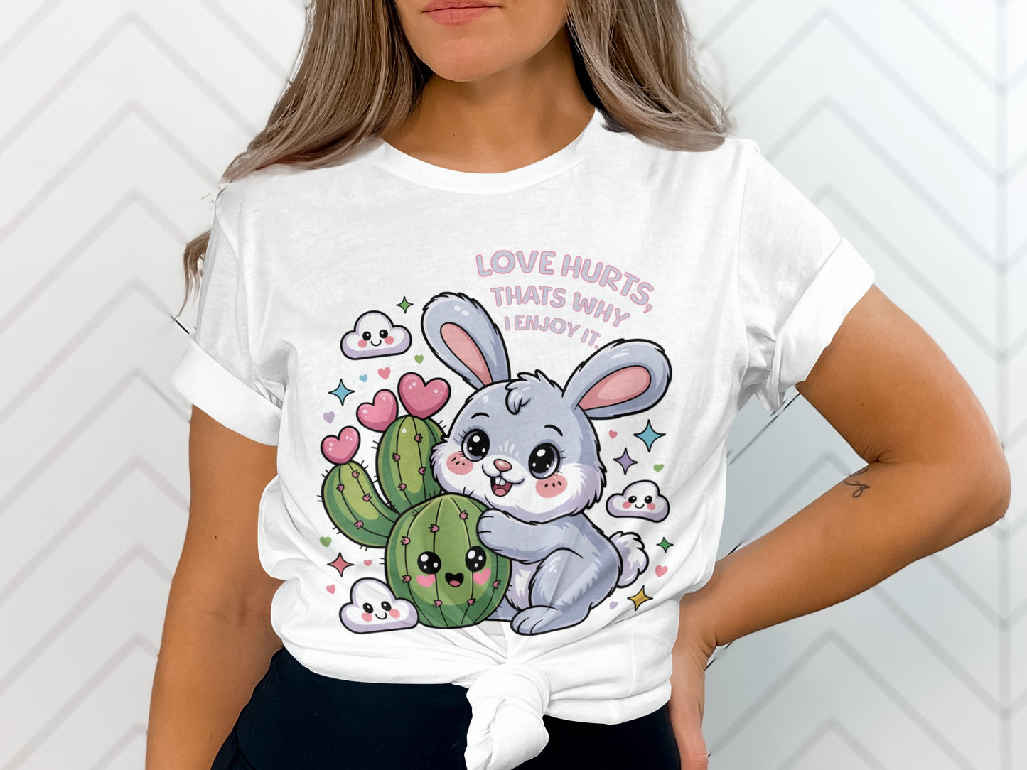 T-shirt with a cute bunny hugging a cactus and text "LOVE HURTS, THATS WHY I ENJOY IT."
