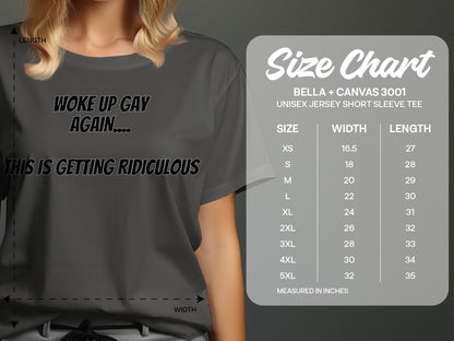 Dark grey t-shirt with "WOKE UP GAY AGAIN.... THIS IS GETTING RIDICULOUS" text and size chart.