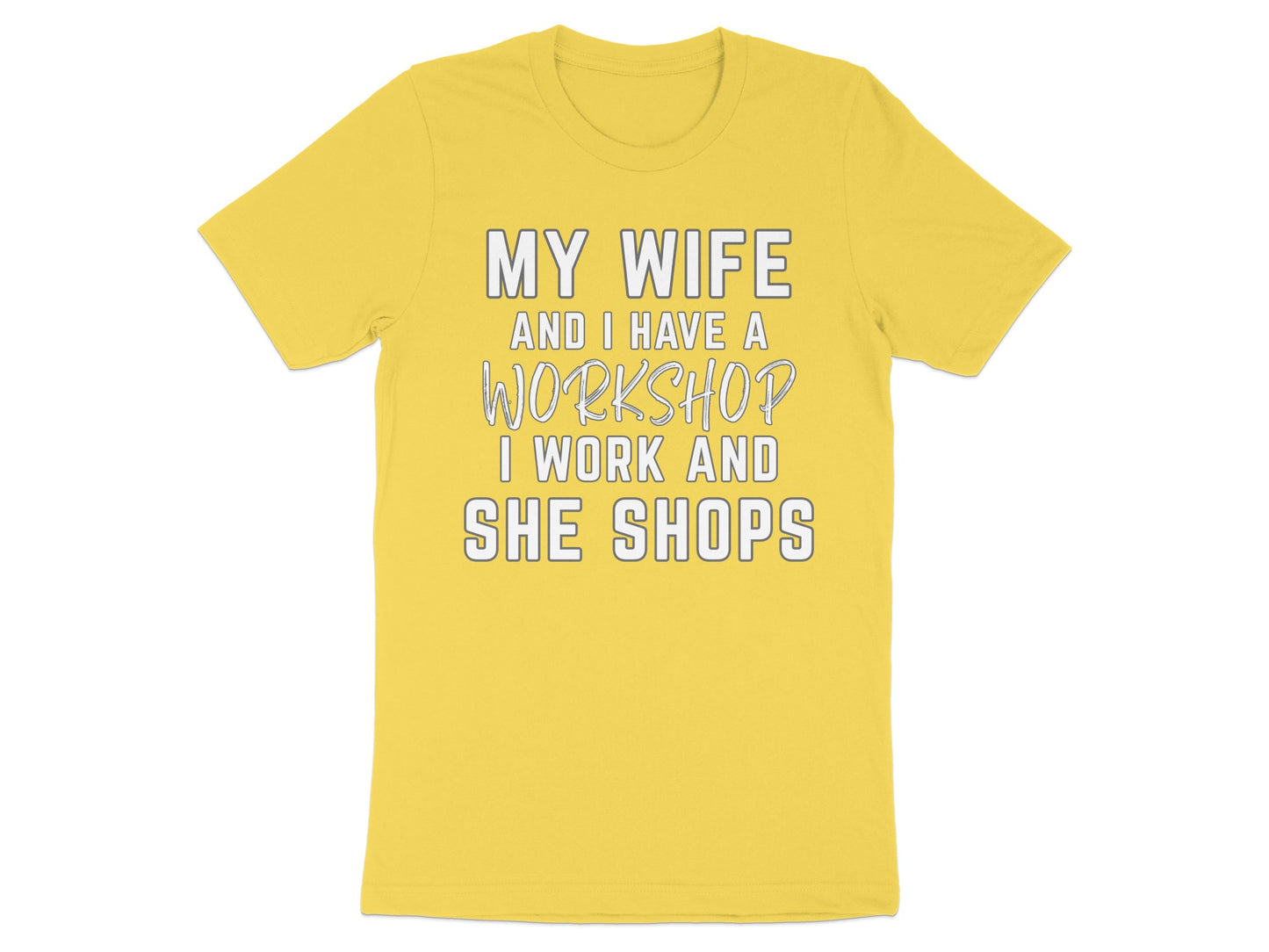Yellow t-shirt with text "MY WIFE AND I HAVE A WORKSHOP I WORK AND SHE SHOPS".