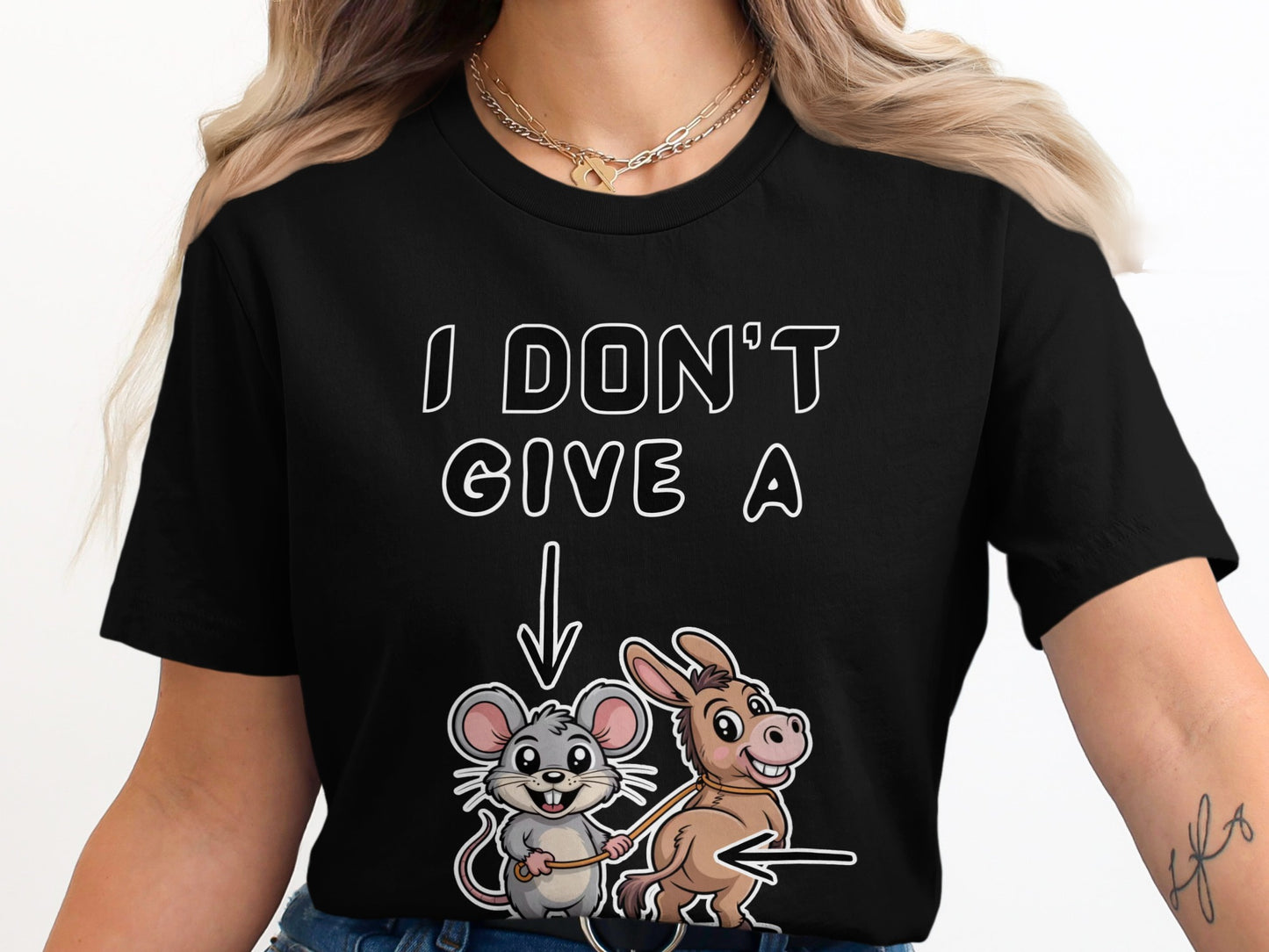 Black t-shirt with white text "I DON'T GIVE A" and cartoon mouse leading a donkey.