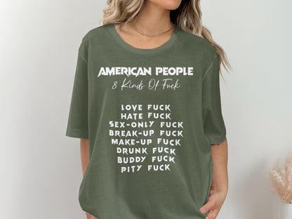 Olive green t-shirt with white text: "American People 8 Kinds Of Fuck" and a list.