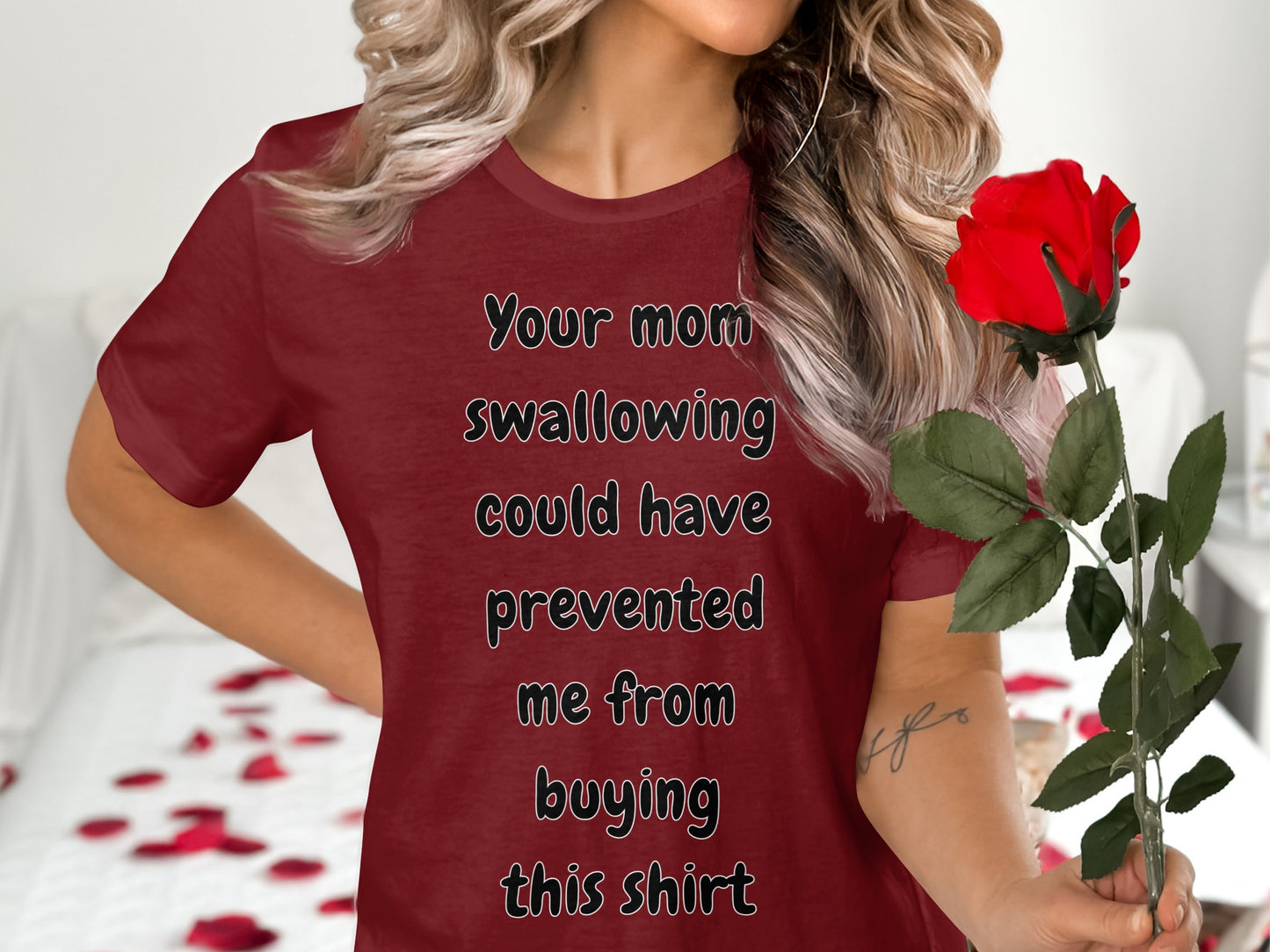 Maroon t-shirt with text "Your mom swallowing could have prevented me from buying this shirt."