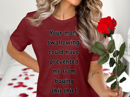 Maroon t-shirt with text "Your mom swallowing could have prevented me from buying this shirt."