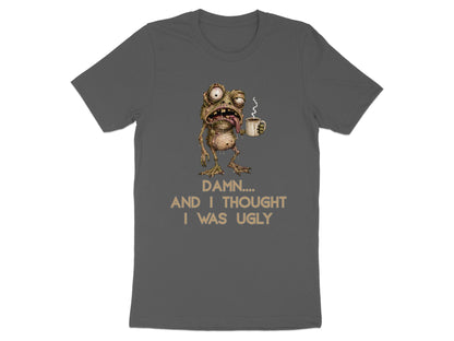 Dark grey t-shirt with a cartoon monster holding a coffee mug and text.