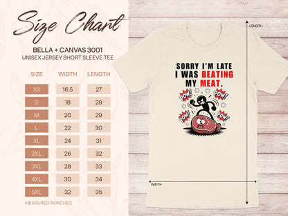 Cream Bella + Canvas t-shirt with "Sorry I'm Late I Was Beating My Meat" graphic.