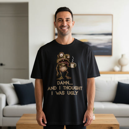 Black t-shirt with a cartoon frog holding coffee and text "DAMN.... AND I THOUGHT I WAS UGLY".