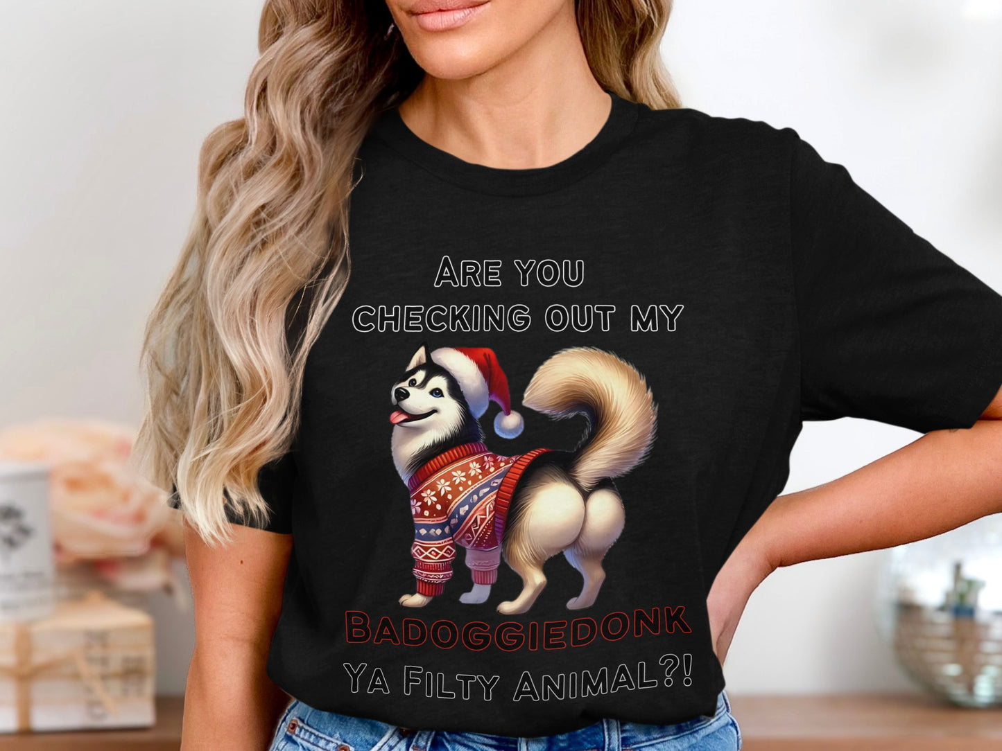 Black t-shirt with husky wearing Santa hat, Christmas sweater. Text reads "BADOGGIE DONK YA FILTY ANIMAL?!"