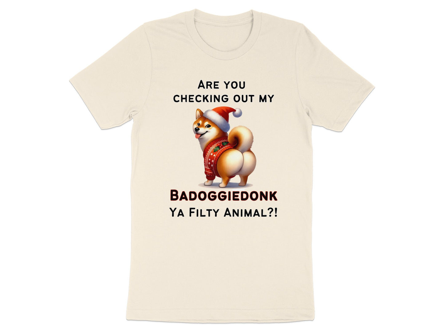Cream t-shirt with a Shiba Inu wearing a Santa hat and holiday sweater.