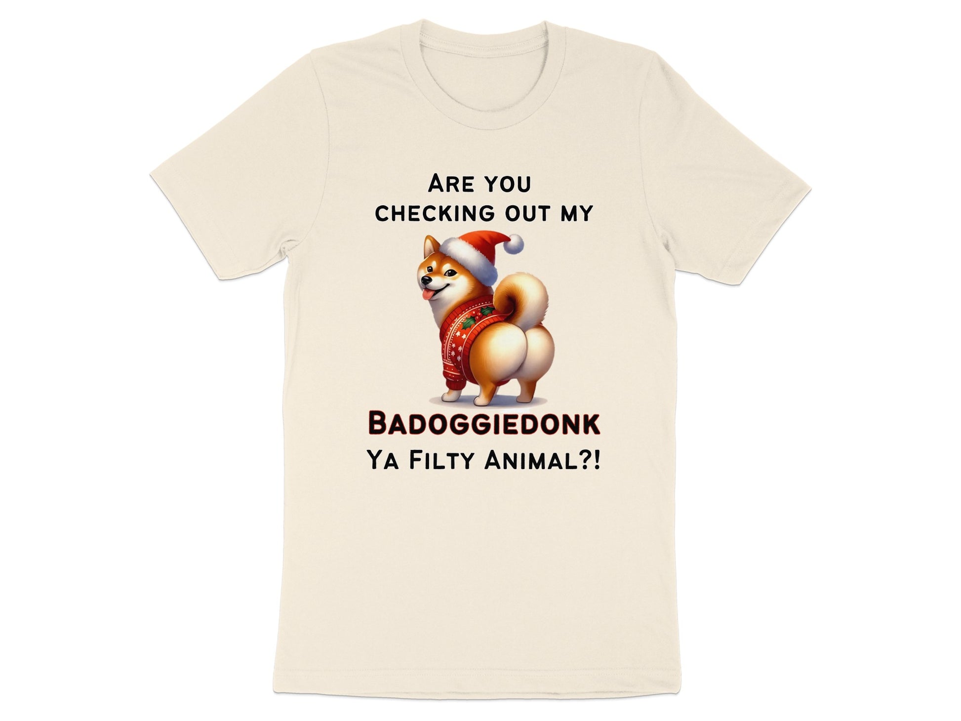 Cream t-shirt with a Shiba Inu wearing a Santa hat and holiday sweater.