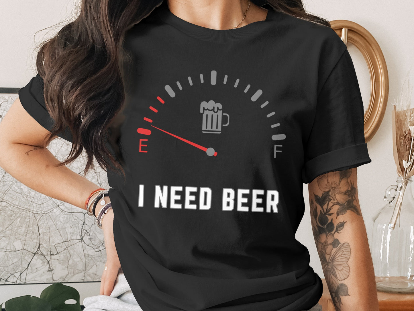 Black t-shirt with a fuel gauge graphic and "I NEED BEER" text.