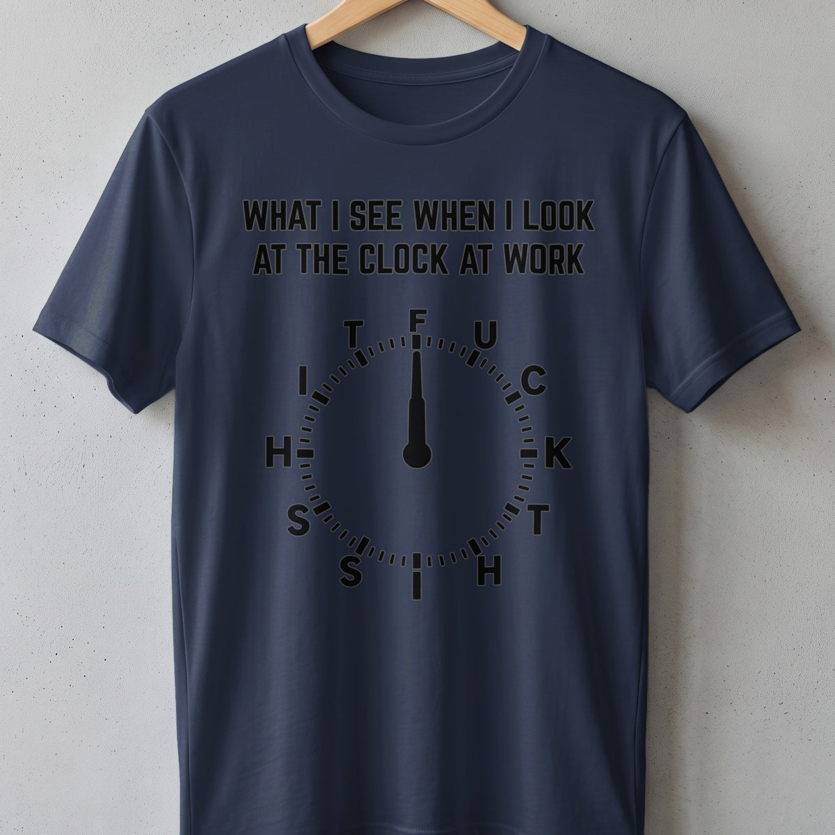 Navy t-shirt with text "WHAT I SEE WHEN I LOOK AT THE CLOCK AT WORK" and a clock graphic.