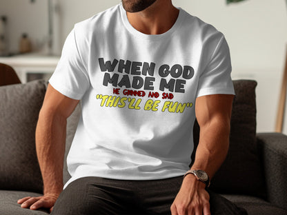 White t-shirt with "When God Made Me He Grinned And Said 'This'll Be Fun'" text.