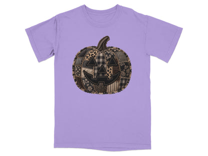 Purple t-shirt with a stitched patchwork jack-o'-lantern graphic on the front.