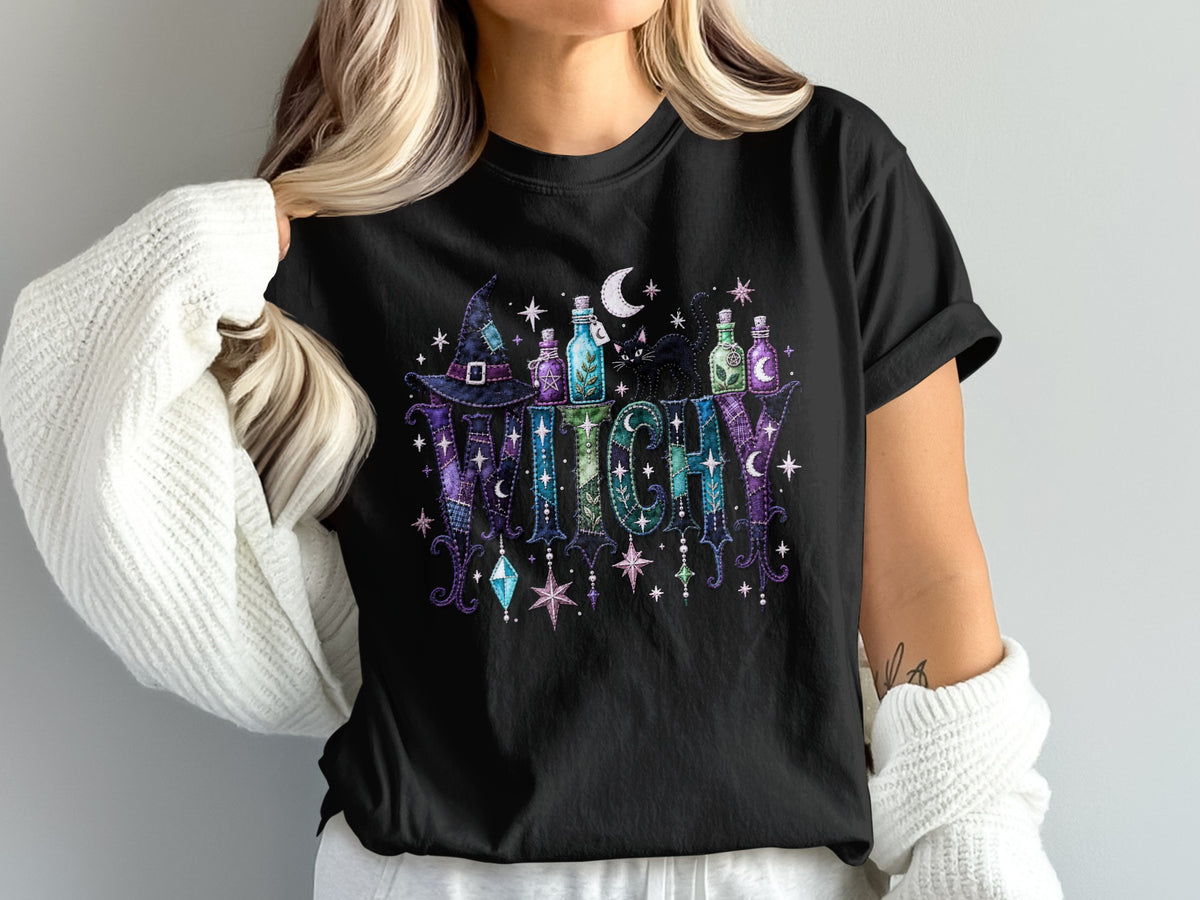 Black t-shirt with "WITCHY" text, hat, potions, cat, moon, and stars.